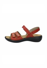 Rode leren sandalen met een open teen, twee verstelbare banden en een gevoerde inlegzool. Zwarte rubberen zool en een gevormde voetbed voor ondersteuning.