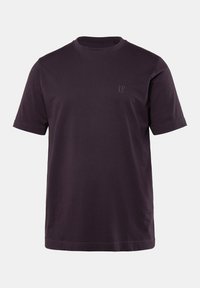 Kortærmet t-shirt med rund hals i mørkelilla. Fremstillet af glat bomuld. Har et diskret logo foran i en matchende farve.