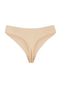 Beige thong with a smooth texture, wide waistband, and minimalist design featuring a V shape at the front and a seamless finish.