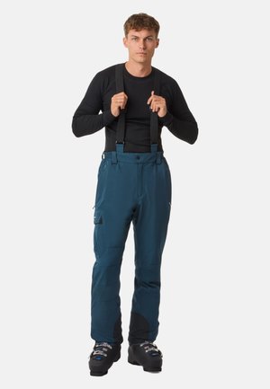 Men's snow pants in dark teal, made from durable material, featuring adjustable black suspenders, side pockets, and black accent detailing.