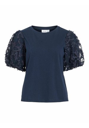 Haut bleu marine à manches courtes avec encolure ronde et manches bouffantes transparentes brodées de détails en dentelle florale.