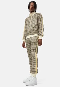 Lonsdale SET Tracksuit yellow/brown/ecru/yellow Zalando