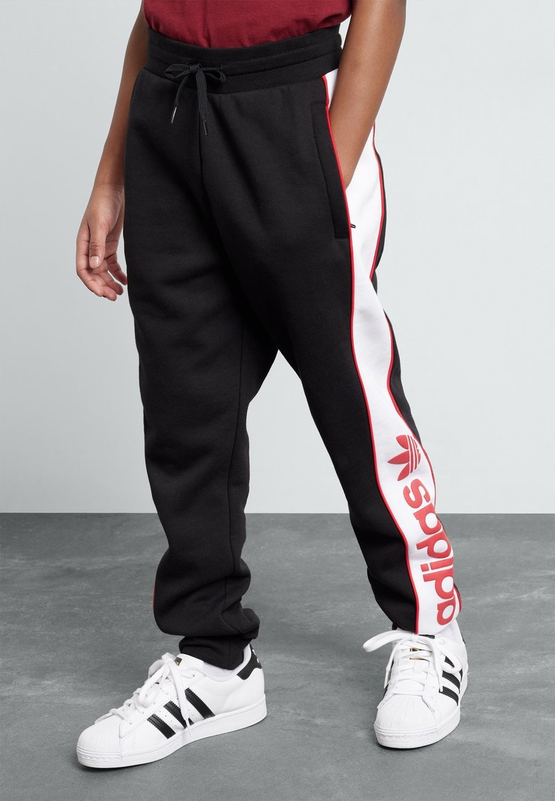 adidas Originals PANTS JUNIOR UNISEX - Träningsbyxor - black/better scarlet