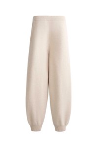 Beige knit wide-leg jogger pants with elastic waistband and cuffs, featuring a relaxed fit and side pocket.