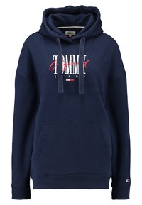 Mörkblå huvtröja med framficka, dragsko på huven och vit/röd logotext. Tillverkad av mjukt tyg med ribbade ärmslut och nederkant.