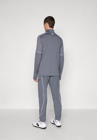 Under Armour CHALLENGER WARM UP  - Treningo apatinė dalis - castlerock/white