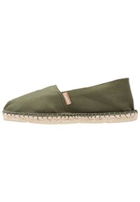Olive green canvas espadrille with a woven jute sole, featuring a rounded toe and minimal stitching accents. No visible branding.