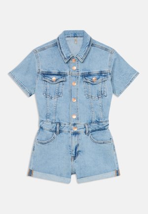 Light blue denim short jumpsuit with a collar, short sleeves, chest pockets, and a belted waist. Features copper-tone buttons and rolled cuffs.