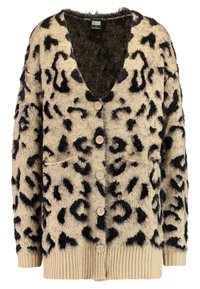 Beige Leopardprint-Cardigan mit schwarzem, flauschigem Muster, V-Ausschnitt, Holzknöpfen und gerippten Bündchen. Mit zwei vorderen Taschen.