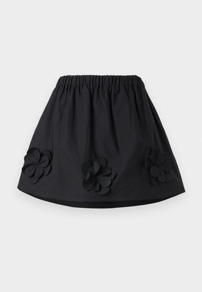 Fekete pamut szoknya elasztikus derékpánttal, az alján három rétegű virágapplikációval. Egyszerű A-vonalú kialakítás sima textúrával.