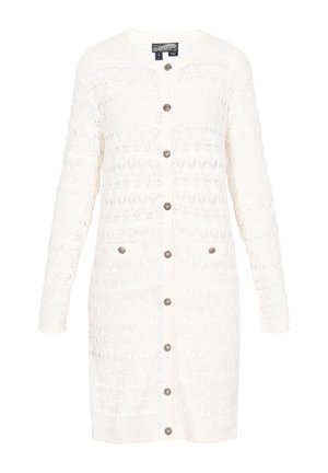 Balts adīts adījums ar garām piedurknēm, priekšējiem pogām un divām kabatām. Iezīmējas ar atvērtas struktūras dizainu un apaļu kakla izgriezumu.