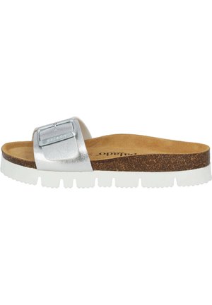 Silver metallic slide sandal with a wide strap and adjustable buckle, featuring a cork footbed and white rubber outsole with a textured surface.