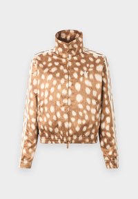 Veste marron zippée avec motif blanc à pois, col montant, poignets élastiques et bandes blanches Adidas sur les manches.