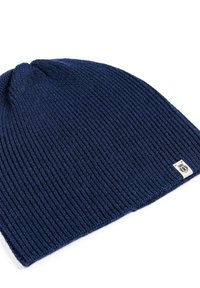 Navy blue knitted beanie with a ribbed texture, rounded top, and a small, rectangular woven label on the edge.