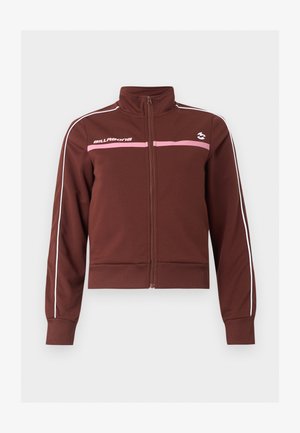 Veste marron zippée avec une bande horizontale rose, un passepoil blanc sur les manches, des poignets et un ourlet côtelés, et la marque "Billabong" sur la poitrine.