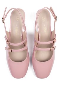 Pink patent leather slingback shoes with two buckled straps, square toe, and a smooth texture. L37 logo embossed on the insole.