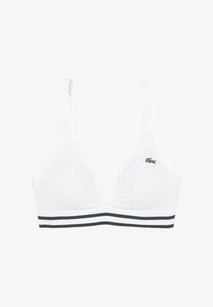 Bralette de triángulo blanco con tirantes finos ajustables, banda elástica de rayas verdes y blancas, y pequeño logo de cocodrilo verde en la copa izquierda.