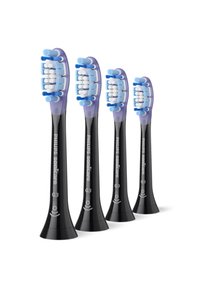 Quatre têtes de brosse à dents Philips Sonicare G3 noires avec des poils bleu-violet et un design incurvé, présentant une finition lisse et un étiquetage.
