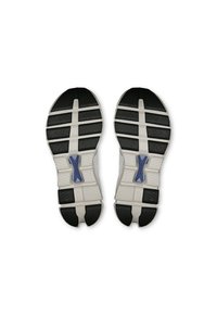 Sneaker outsole features a black rubber tread with flexible grooves, white midsole, and a blue accent in the center for support.