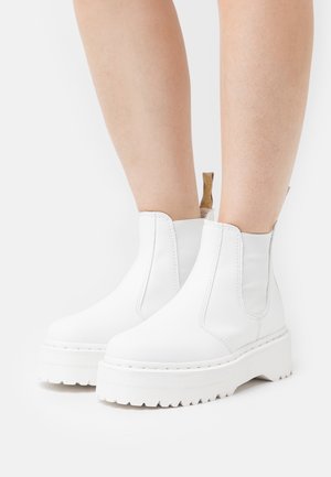 Dr. Martens, Bottines à plateau - white
