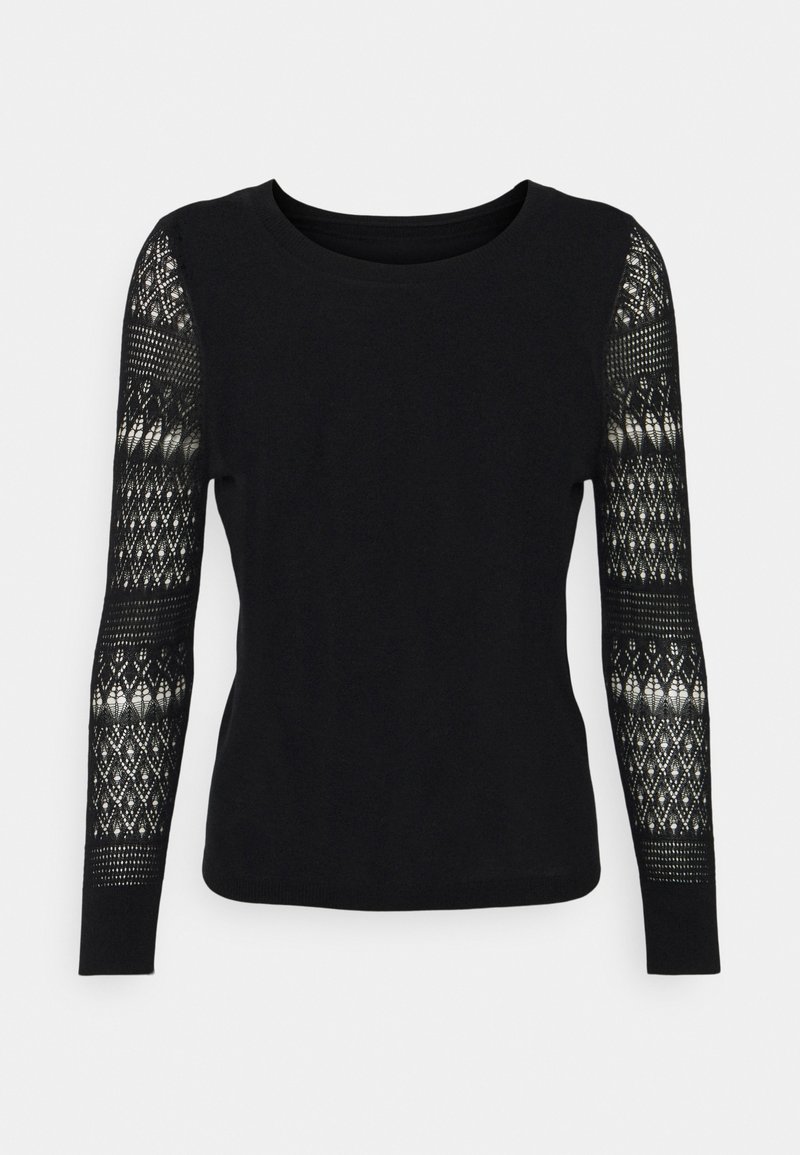 Top noir à manches longues avec devant uni et manches transparentes en dentelle délicate, encolure ronde et silhouette ajustée.