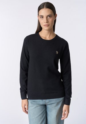 Maglione nero a maglia con scollo rotondo e maniche lunghe, dotato di un piccolo design ricamato sul lato sinistro del petto e polsini a coste.