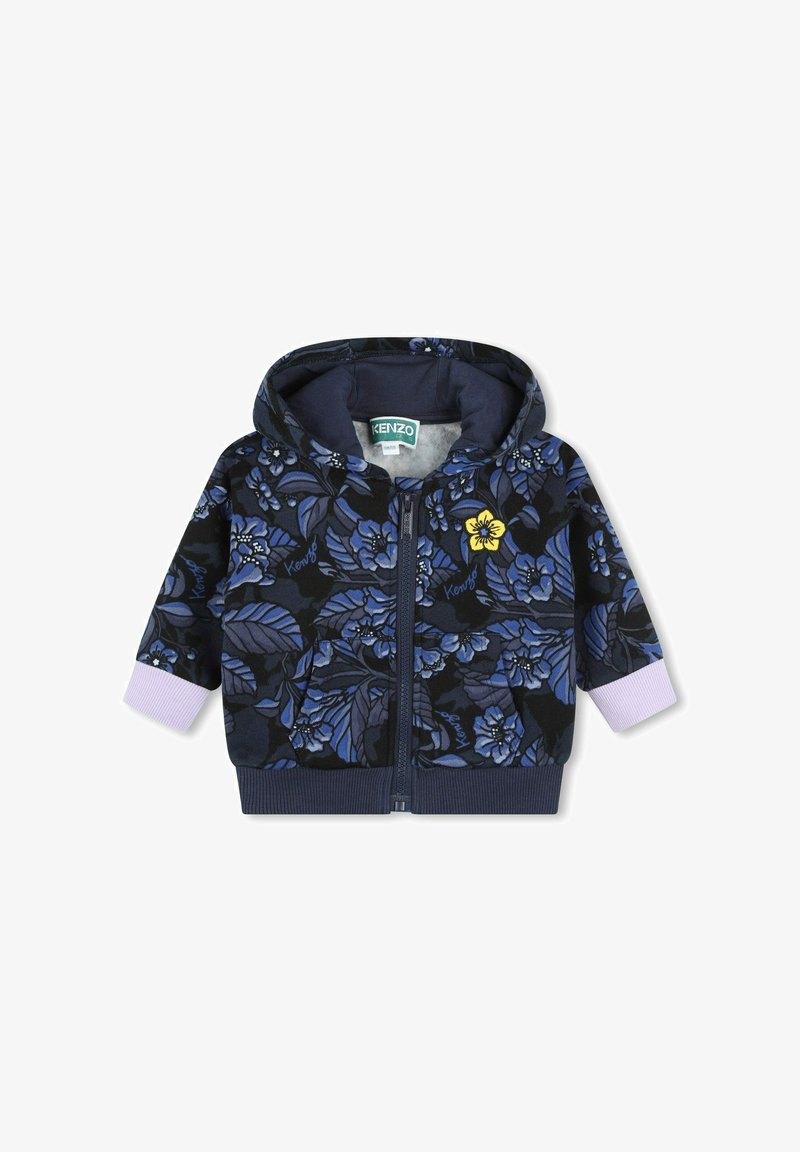 Veste à capuche zippée de couleur bleu foncé avec un motif floral. Comprend un accent de fleur jaune et des poignets violets. Tissu doux avec une finition texturée.
