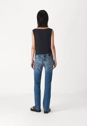 Vaqueros bootcut - light-blue denim