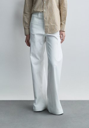 WOVEN FLARE PANTS - Nadrágok - nevis