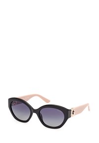 Gafas de sol estilo gato con montura negra y lentes degradados, con brazos rosas y detalles en dorado. Textura suave en toda su superficie.