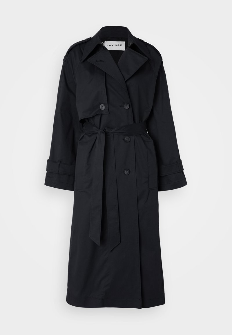 Cappotto trench nero con davanti doppiopetto, ampie rever e vita cintrata. Realizzato in tessuto liscio con taglio di lunghezza media e maniche con risvolto.