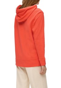 Hooded sweatshirt i klar korall, med långa ärmar, avslappnad passform och ett snug midjeband. Mjukt tyg med en slät textur.