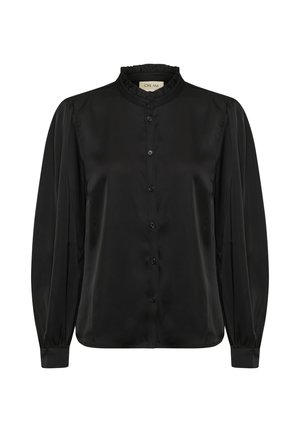 Juoda šilko bliuska su volangu ant apykaklės, sagčių užsegimu priekyje ir ilgomis rankovėmis su raukiniais. Lygus tekstūra su nedideliu blizgesiu.