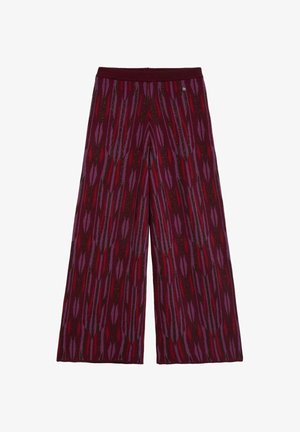 Pantalones de pierna ancha en un patrón púrpura y burdeos, con formas de hojas alargadas y acentos negros. Tejido de punto con un acabado texturizado.