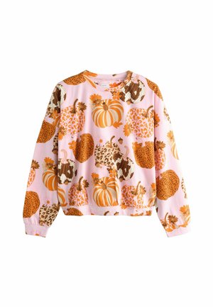 Long-sleeve sweatshirt in pink featuring a pattern of orange pumpkins, leopard prints, and floral accents. Soft material with ribbed cuffs.