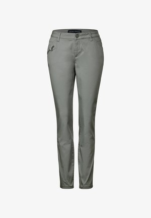 Pantalones grises ajustados para mujer con trabillas, botón delantero, cremallera y un pequeño bolsillo con cremallera en la cadera derecha.