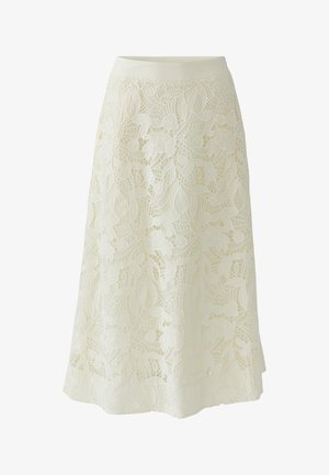 Witte A-lijn rok van kant met bloem- en bladmotieven en een nauwsluitende tailleband.