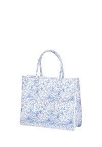 Blå og hvid mønstret totebag med to håndtag, lavet af stof. Har blomsterdesign med detaljeret udsmykning og en struktureret form.