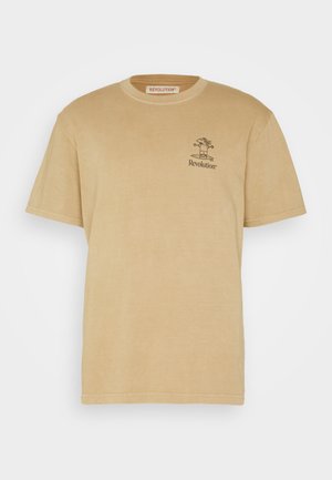 Beige cotton t-shirt with a crew neckline, short sleeves, and a small black graphic featuring a character and the word "Revolution" on the chest.