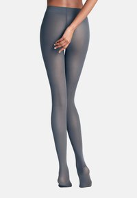 Collant grigi trasparenti con una texture liscia, design aderente e punte rinforzate. La vita è elastica, garantendo una vestibilità sicura.