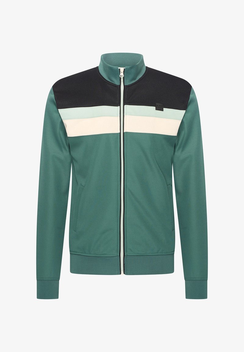 Veste zippée vert sarcelle avec une section supérieure noire, des rayures horizontales blanches et bleu clair, un col montant et des poches latérales.