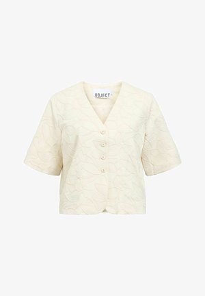 Blouse crème à manches courtes avec motif de feuilles texturé, col en V et quatre boutons sur le devant, marque OBJECT à l'intérieur du col.