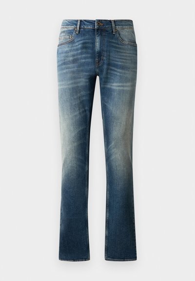 Blå denimjeans med rak benmodell, med en blekt tvätt, fem fickor och en brun knapp i midjan.