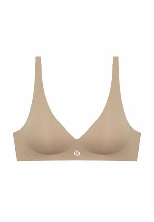 Soutien-gorge sans fil couleur nude avec une texture lisse, en forme de V profond, bretelles réglables et un petit logo au centre. Design minimaliste.
