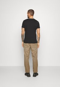 icebreaker BERLIN - Pantalon classique - MEDIUM BEIGE