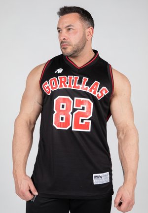 Zwarte mouwloze basketbaljersey met rode accenten, de tekst 'GORILLAS', nummer '82', en een logo op de boven linkerzijde. Textuur van de stof is zichtbaar.