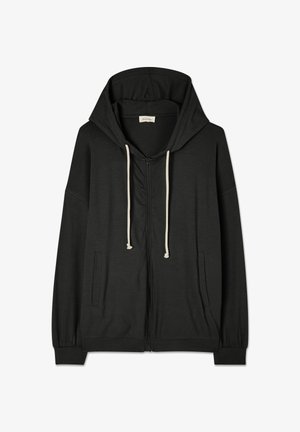 Svart huvtröja med hel dragkedja, vita dragsnören, framfickor och elastiska muddar, uppvisad på en vit bakgrund.