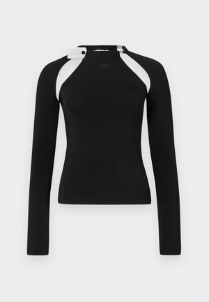 Melnā garā piedurkne augšdaļa ar piegulošu dizainu, kas satur baltus plecu akcentus un metāla detaļu pie kakla. Mīksts, elastīgs audums.