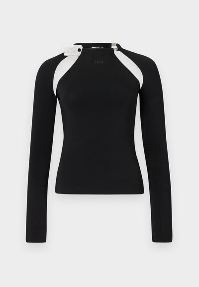 Fekete, hosszú ujjú felső, testhez simuló fazonnal, fehér vállrész kiegészítőkkel és fényes címkével a nyakán. Puha, rugalmas anyag.