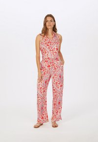 Rot-weißer Jumpsuit mit Muster, Kragen, ärmellosem Design, elastischem Bund und weitem Beinschnitt. Verfügt über Seitentaschen.